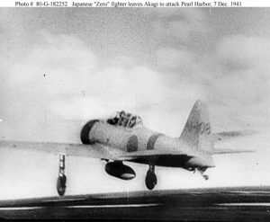 A Japanese Navy Mitsubishi A6M2 "Zero" fighter (tail code A1-108) takes off from the aircraft carrier Akagi, on its way to attack Pearl Harbor during the morning of 7 December 1941. The aircraft was flown by PO2c Sakae Mori, 1st koku kantai, 1st koku sentai, and flew with the second wave.