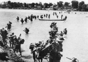The British Indian Army's Gurkha Rifles crossing the Irrawaddy River on 27 January 1945.