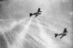 A still from camera gun film shows tracer ammunition from a Supermarine Spitfire Mark I of No. 609 Squadron RAF, flown by Flight Lieutenant J H G McArthur, hitting a Heinkel He III on its starboard quarter. These aircraft were part of a large formation from KG 53 and KG 55 which attacked the Bristol Aeroplane Company's works at Filton, Bristol, just before midday on 25 September 1940