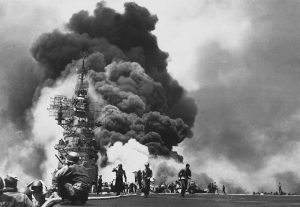 "USS BUNKER HILL hit by two Kamikazes in 30 seconds on 11 May 1945 off Kyushu. Dead-372. Wounded-264., 1943 - 1958", from Archival Research Catalog.