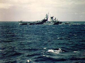 The U.S. Navy large cruiser USS Alaska (CB-1) photographed from USS Missouri (BB-63) off the U.S. east coast during their shakedown cruise together in August 1944. Note her Measure 32 camouflage. August 1944.