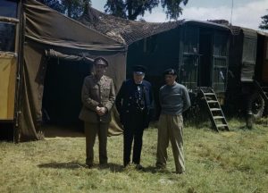 Left to right: The Chief of the Imperial General Staff, Field Marshal Sir Alan Brooke Mr Winston Churchill Commander of the 21st Army Group, General Sir Bernard Montgomery at Montgomery's mobile headquarters in Normandy. Date 12 June 1944