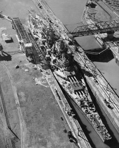 USS Missouri (BB-63) in the Miraflores Locks, Panama Canal, 13 October 1945, while en route from the Pacific to New York City to take part in Navy Day celebrations. Note the close fit of the ship in the locks. The beam of battleships of this era was determined by Panama Canal lock dimensions. Photo #: 80-G-701369 Official U.S. Navy Photograph, now in the collections of the National Archives.