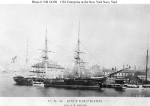 USS Enterprise at the New York Navy Yard, circa spring 1890, when she was commanded by Commander Bowman H. McCalla. The receiving ship Vermont is in the background. Photographed by E.H. Hart, New York City. U.S. Naval Historical Center Photograph. Date circa 1890