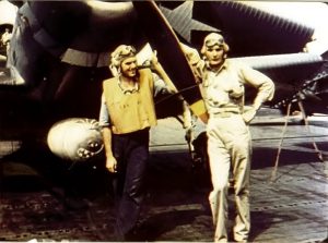 Ensign George Gay (right), sole survivor of VT-8 at Midway, standing beside his TBD Devastator on June 4, 1942 before the Battle of Midway. The other crewman pictured is one of his rear gunners.
