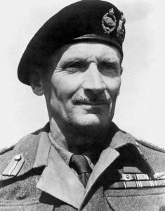 Montgomery wearing his beret with two cap badges